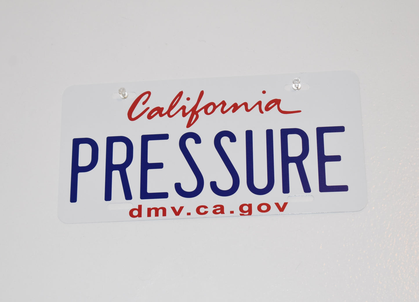 "PRESSURE" LICENSE PLATE COLLECTIBLE